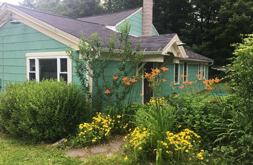 Newfield House | Farmhouse Gem with Gardens, Waterfalls and Orchards