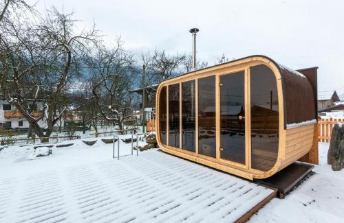 Bramberg am Wildkogel House | Farmhouse in Bramberg with Natural Pond