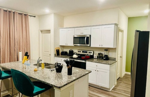 Crowley House | Fenced Yard Foosball Putting Green