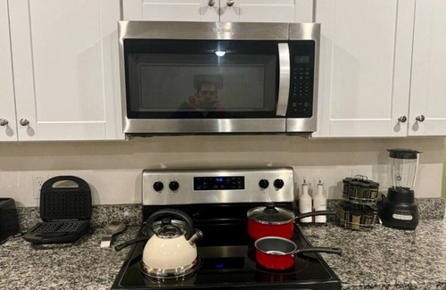 Crowley House | Fenced Yard Foosball Putting Green