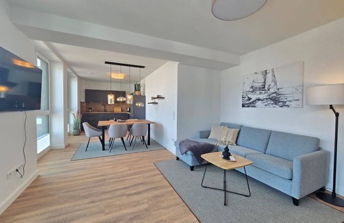 Norden Apartment | Ferienappartment Hafenblick - Herzlich Willkommen in der Zauberhaften Ferienwohnung Hafenblick!