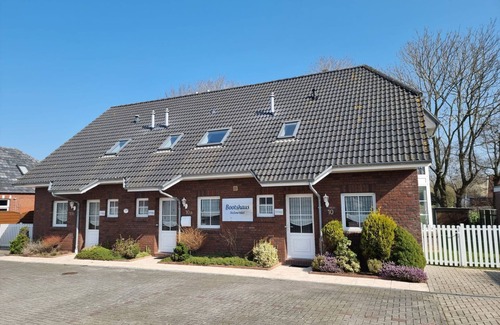 Neßmersiel House | Ferienhaus Backbord im Bootshaus - Herzlich Willkommen im Reihenhaus Backbord im Bootshaus!
