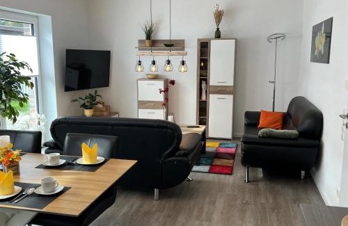 Apeldorn Apartment | Ferienhaus "Golden Delicious" Meppen Ebenerdig Carport Terrasse Neubau NETFLIX Free WIFI 2 Schlafzimmer Küche GästeWC