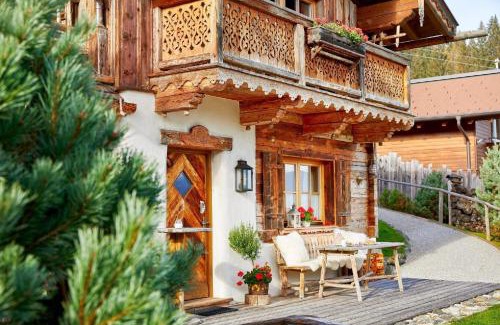 Hundsdorfl House | Ferienhaus im Almdorf in Flachau