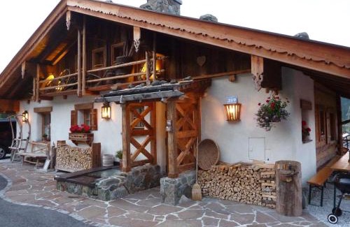 Hundsdorfl House | Ferienhaus im Almdorf in Flachau