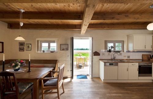 Grubnow House | Ferienhaus Remise direkt am Wasser im Gut Grubnow Rügen