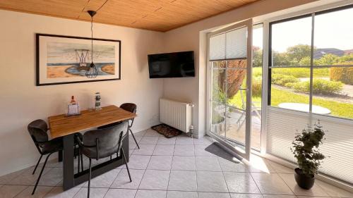 Dorumer Neufeld Apartment | Ferienwohnung am Sonnenstrahl