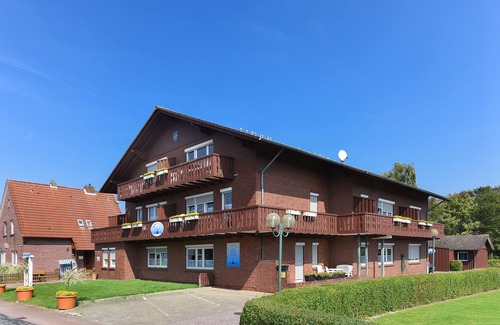 Neuharlingersiel Apartment | Ferienwohnung Gebrüder - Haus Hafenromantik in Neuharlingersiel