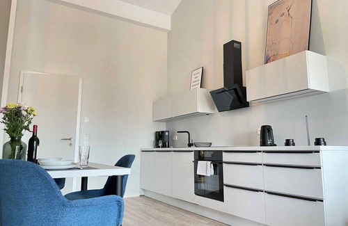 Suderneuland I Apartment | Ferienwohnung Deichmühle - Herzlich Willkommen in der Exklusiven Ferienwohnung Deichmühle Zentral in