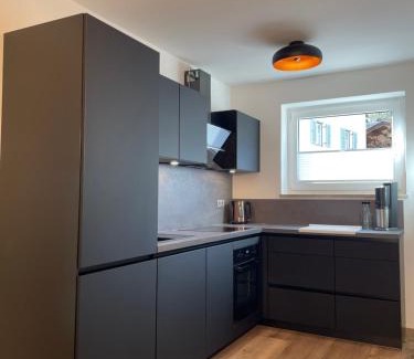 Mittenwald Apartment | Ferienwohnung mit Terrasse und Garten mit Blick auf das Karwendelgebirge