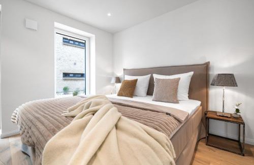 Kappeln Apartment | Ferienwohnung Nordglanz – Modernes Beachhouse-Flair im Herzen des OstseeResort Olpenitz