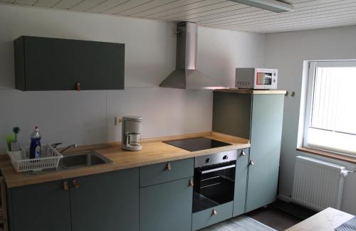 Buedelsdorf Apartment | Ferienwohnung Roggenbach - Studio mit Gartenblick