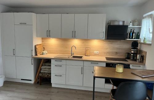 Brauel Apartment | FeWo Brauel am Nordpfad Zevener Geest - Ruhige, moderne 2 Zimmer Wohnung, Ladestation, Parkplatz, Wlan, Garten