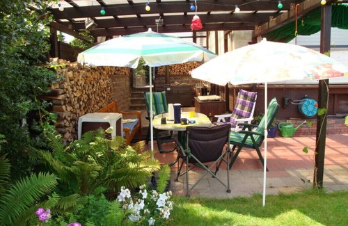 Konigsheide Apartment | " FeWo Königsheide " - outskirts on the ground floor with large garden terraces barbecue