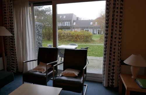 Hollum Apartment | Fine apartment near beach, dunes and forest. With free use of swimming pool.