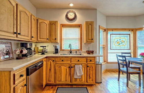 Hiawassee House | Fireside Vista by Chatuge Home Concierge Cozy mountain retreat with lake views, hot tub, game room, and private cinema lounge.