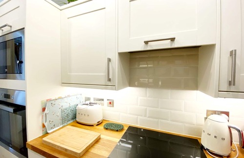Torquay Apartment | First Floor Studio Apartment in charming historic building overlooking gardens.