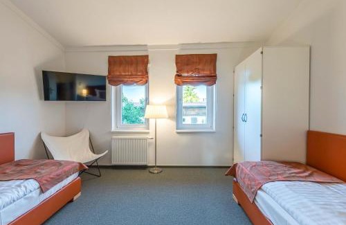 Muritz Apartment | Fischadler - Ferienwohnung mit Terrasse, Kamin, Bootsverleih & Seezugang