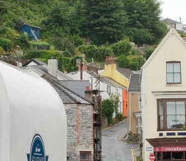 Mumbles House | Fishermen's cottage with log burner, 2 bathrooms & sea views from garden terraces