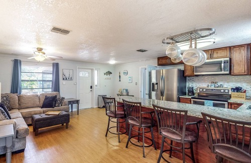 Ruskin House | Fishing getaway with a pool, hot tub, game room, dock, and grill - dog-friendly