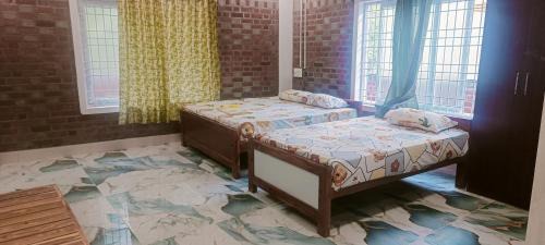 Courtallam Hotel | Five Falls Ramana Villa
