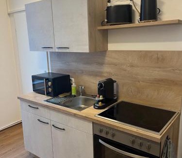 Wittenberge Apartment | Five-O Apartment Precht - QueenSize Bett