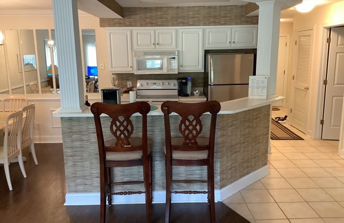 Calabash Condo | FIVE STAR REVIEWS! QUEEN BEDS! Updated Condo with new Pergo Floors