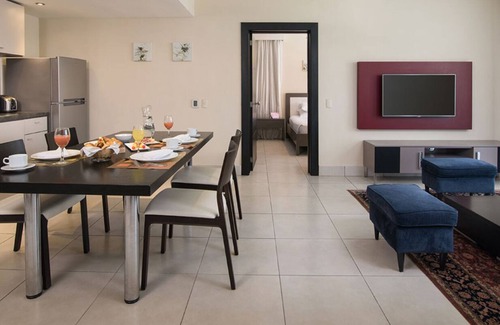 Los Brazos Resort | FIVE STAR VIP experience steps from the Beach!