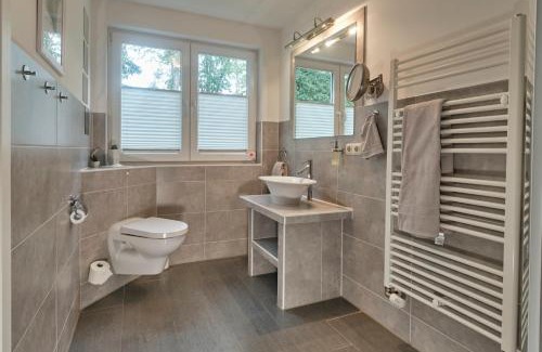 Muritz Apartment | FLEESENTRAUM Seeadler Grand Maisonette - Für Golfer und Familien - Sauna Kamin Balkon Nintendo - Hunde willkommen!