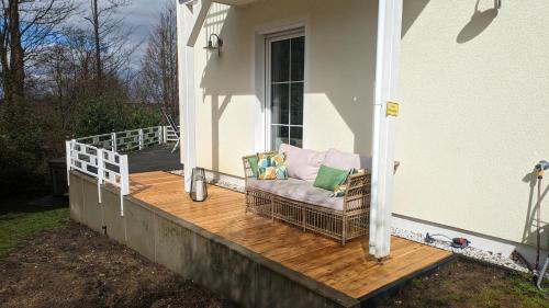 Muritz Villa | FLEESENTRAUM Seevilla Kormoran - Direkt am Fleesensee - Familien und Aktivurlauber - Whirlpool Sauna Garten Nintendo - SUP Kanu Kajak inklusive