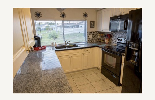 Holiday House | Florida Family Friendly, Waterfront Getaway Near Beaches and Parks!