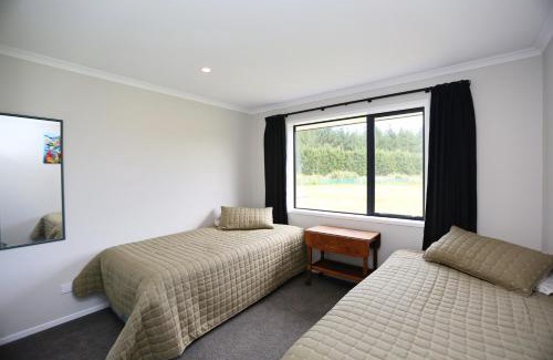 Waitarere Beach House | Forest Charm by the Beach