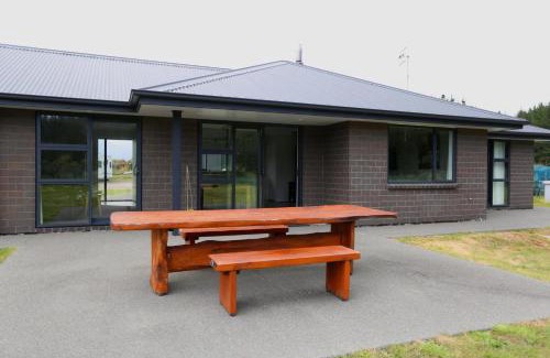 Waitarere Beach House | Forest Charm by the Beach