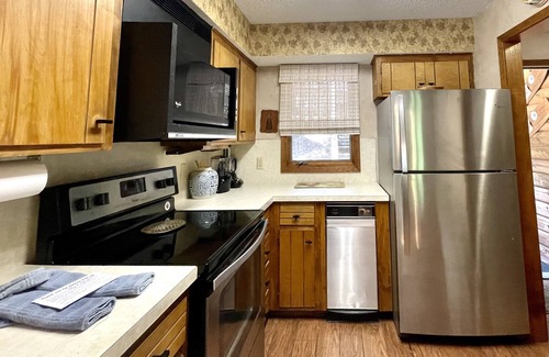 Mount Ida Condo | Forest Retreat Condo, lower level, close to Spa, pool, and lake. We want you!