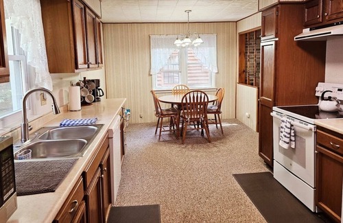 Kalkaska Cottage | Forrest’s Cabin - Lakefront with Sunset Views and Private Dock!