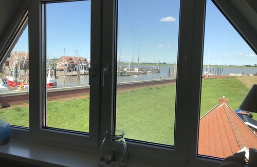 Ditzum House | Four stars at the harbor: Modern renovated fisherman's house directly at the Ditzumer harbor