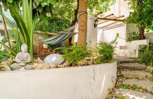 Alfama Apartment | Fragrant Apt with Private Garden in Historic Graça