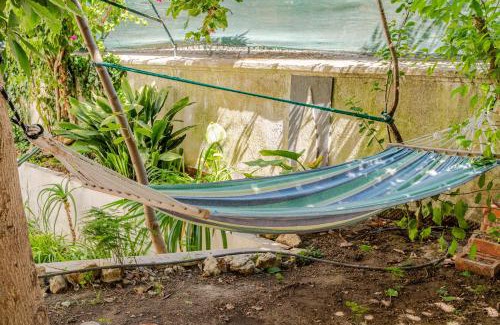 Alfama Apartment | Fragrant Apt with Private Garden in Historic Graça