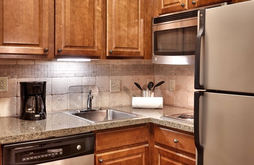 Omaha Condo | Free Breakfast. Pool. Gym. Near the Children’s Hospital!