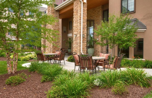 Omaha Condo | Free Breakfast. Pool. Gym. Near the Children’s Hospital!
