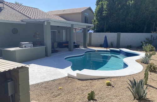 Parke Place House | Free Heated Pool! No pet fee! Electric vehicle charger in garage.