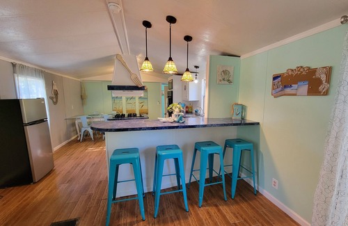Carrabelle House | Freshly renovated mobile home in mermaid style, 5 minutes to the beach.