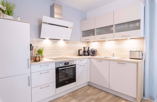 Wangerland Apartment | Friesenkoje vacation apartment: modern relaxation on the North Sea coast.