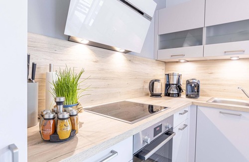 Wangerland Apartment | Friesenkoje vacation apartment: modern relaxation on the North Sea coast.
