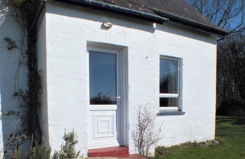 Newton Stewart Cottage | From this delightful cottage enjoy magnificent sea views.