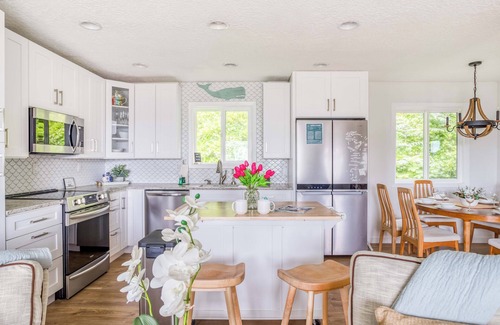 Logsden House | Fully Updated Lincoln City Cottage with Ocean Views has Patio, Decks, Fire Pit!