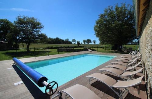 Bouesse Cottage | Fun activities whatever the weather, 2 games rooms, heated swimming pool