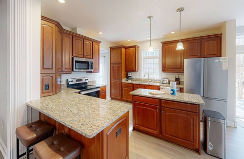 Livingston House | Fun & relaxing getaway with 2 game rooms, fire pits, deck, & more