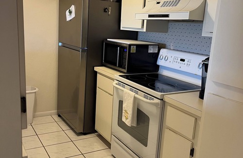 Bokeelia Condo | Furnished 2-bedroom condo in Bokeelia with, boat dock, pool, storage unit, etc.