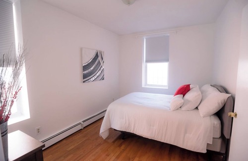 Dudley Square House | Furnished 3- Bedrooms near Hospitals & Universities in vibrant Boston w/Wifi.